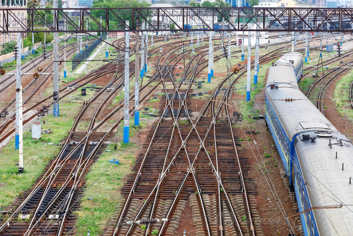 Railroad network with moving train carriages, top view. photo