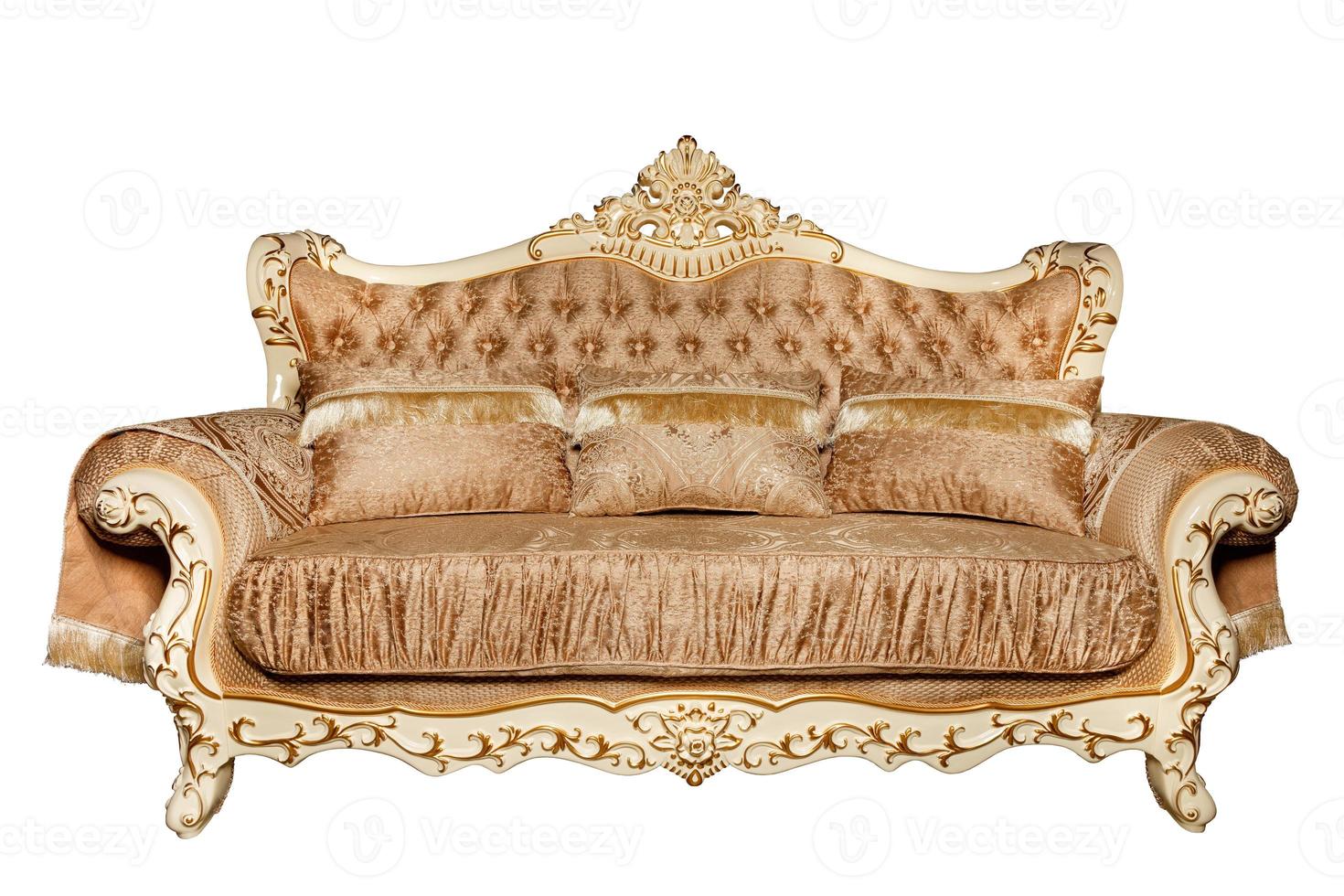 Luxurious sofa upholstered in an expensive light brown brocade textile, isolated on a white background. photo
