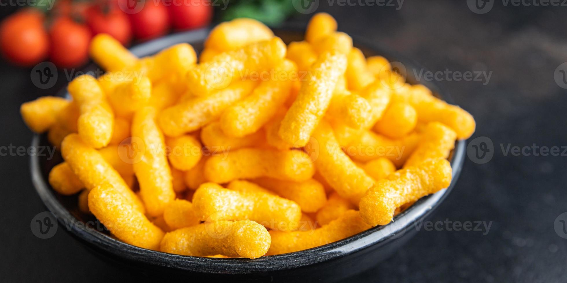 palitos de maíz sabor a tocino cheetos comida rápida foto
