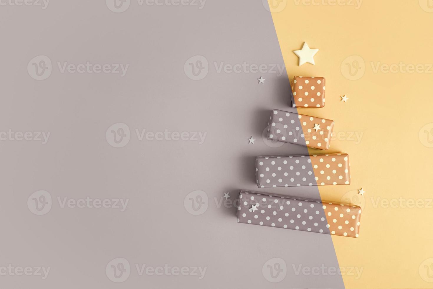 Blank greeting card with abstract Christmas tree made of gift boxes for Merry Christmas and New Year photo