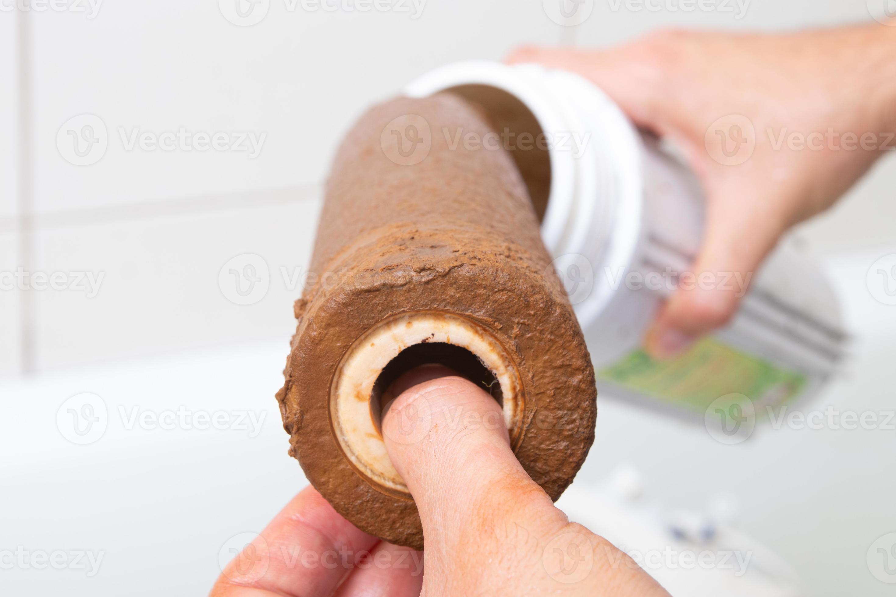 Dirty rusty filter for water purification. Multistage drinking water