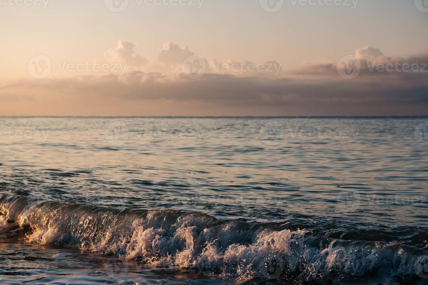 Sunset at sea. Beautiful sunset on the beach and sea photo