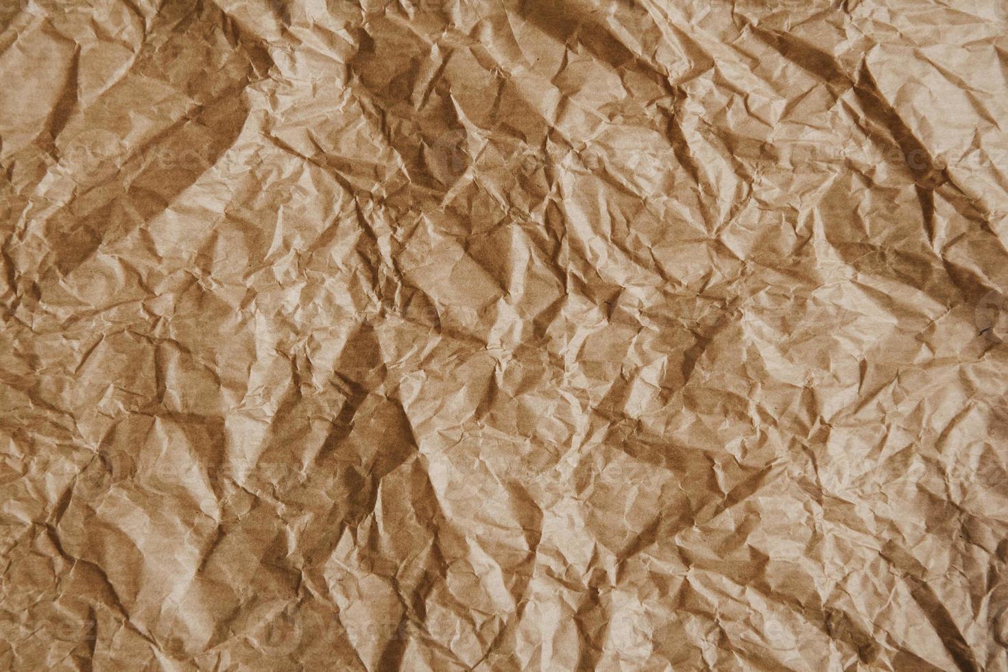 Papel kraft marrón arrugado como imagen de fondo foto