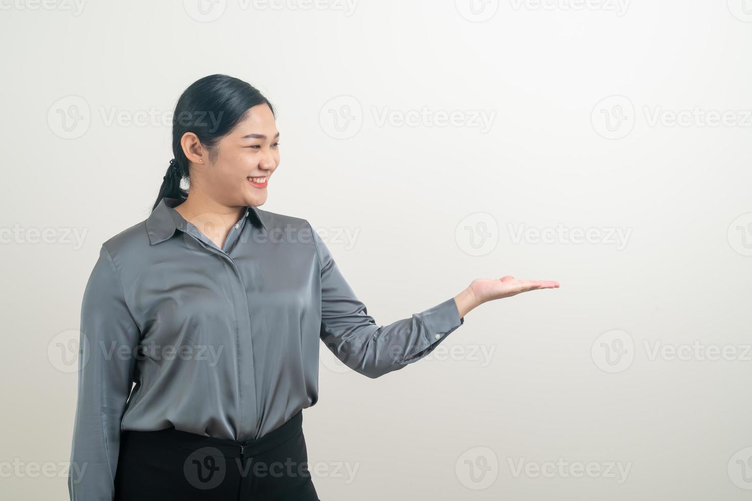 asian woman point or presenting on white background photo