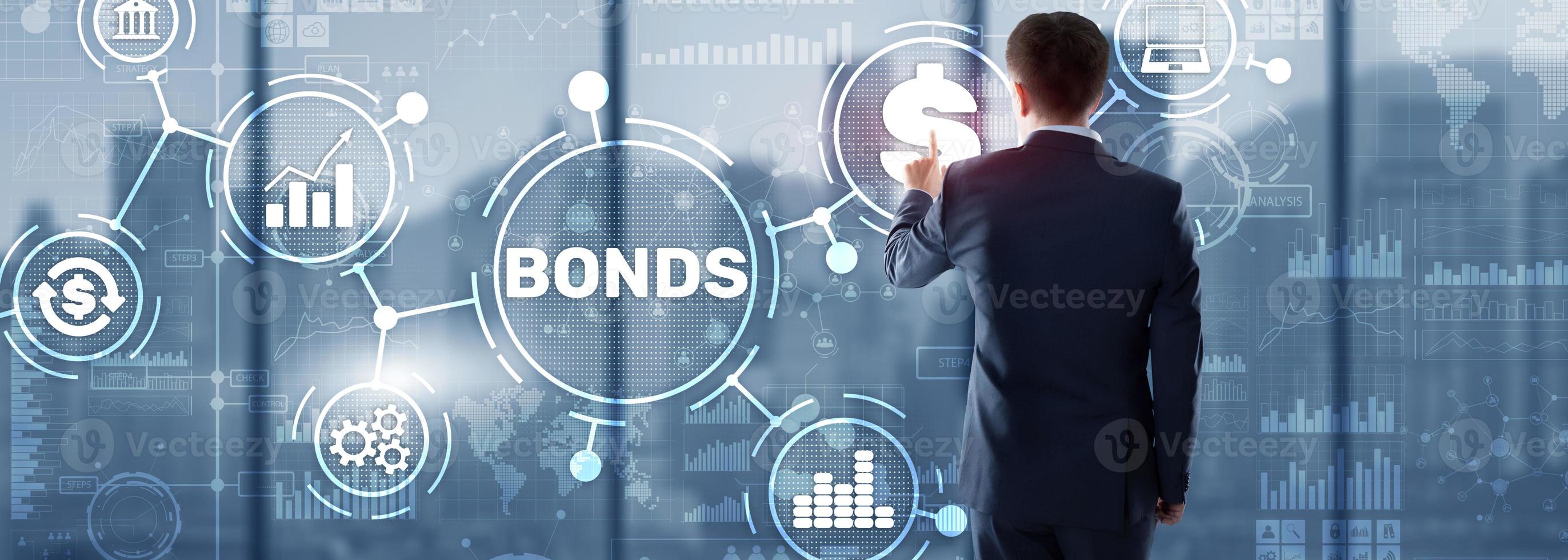 Businessman clicks a bonds virtual screen. Bond Finance Banking Technology concept. Trade Market Network photo