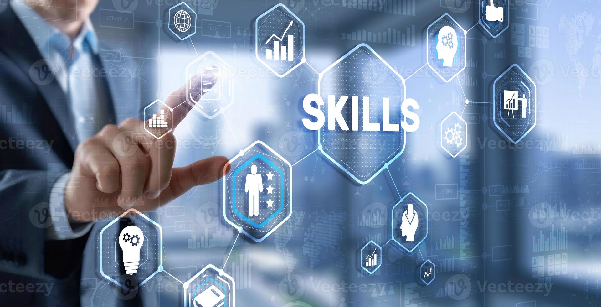 Skill Ability Business Internet technology Concept. Businessman in a jacket clicks on the inscription Skills photo