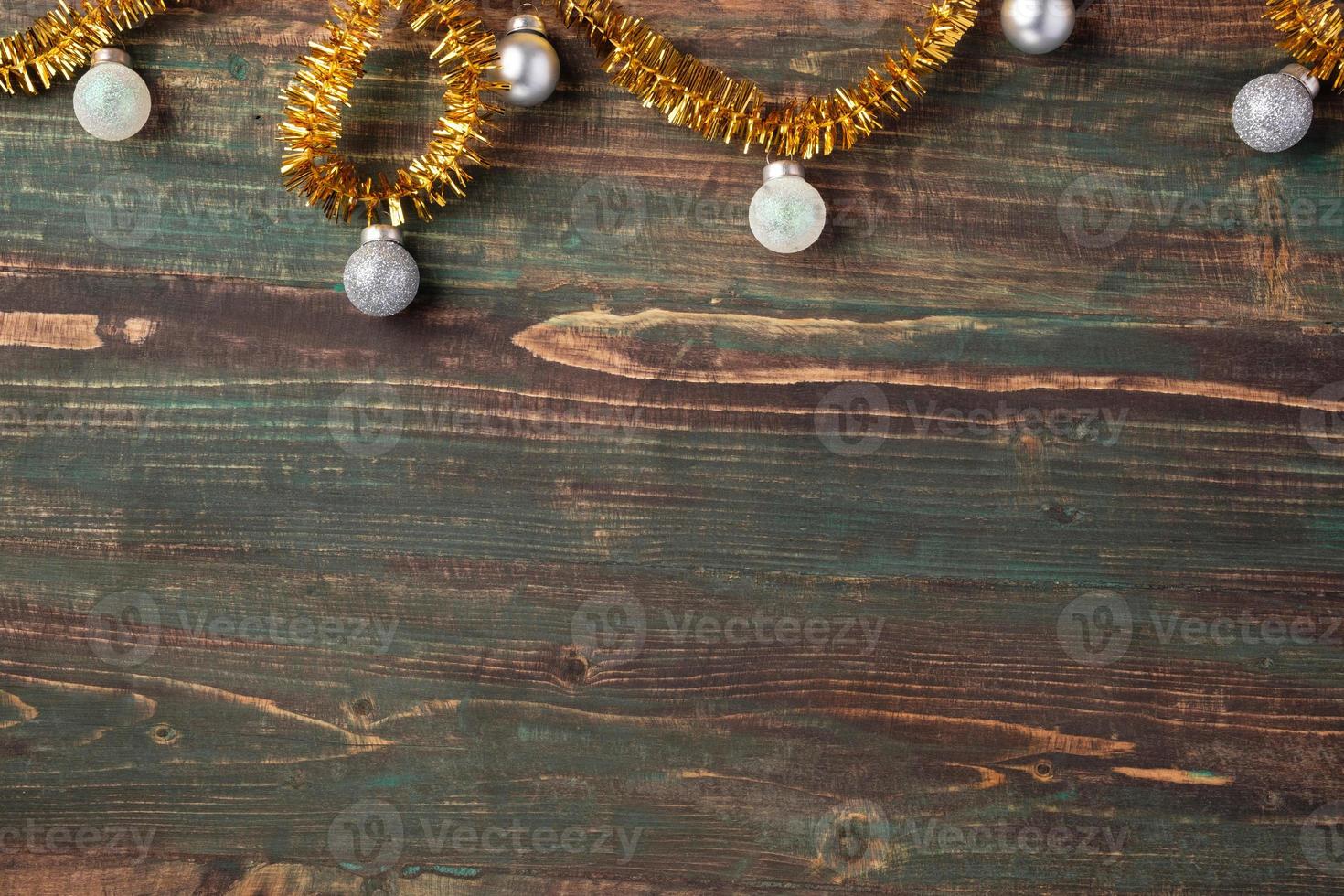 christmas bauble ornament items decoration on wooden table photo