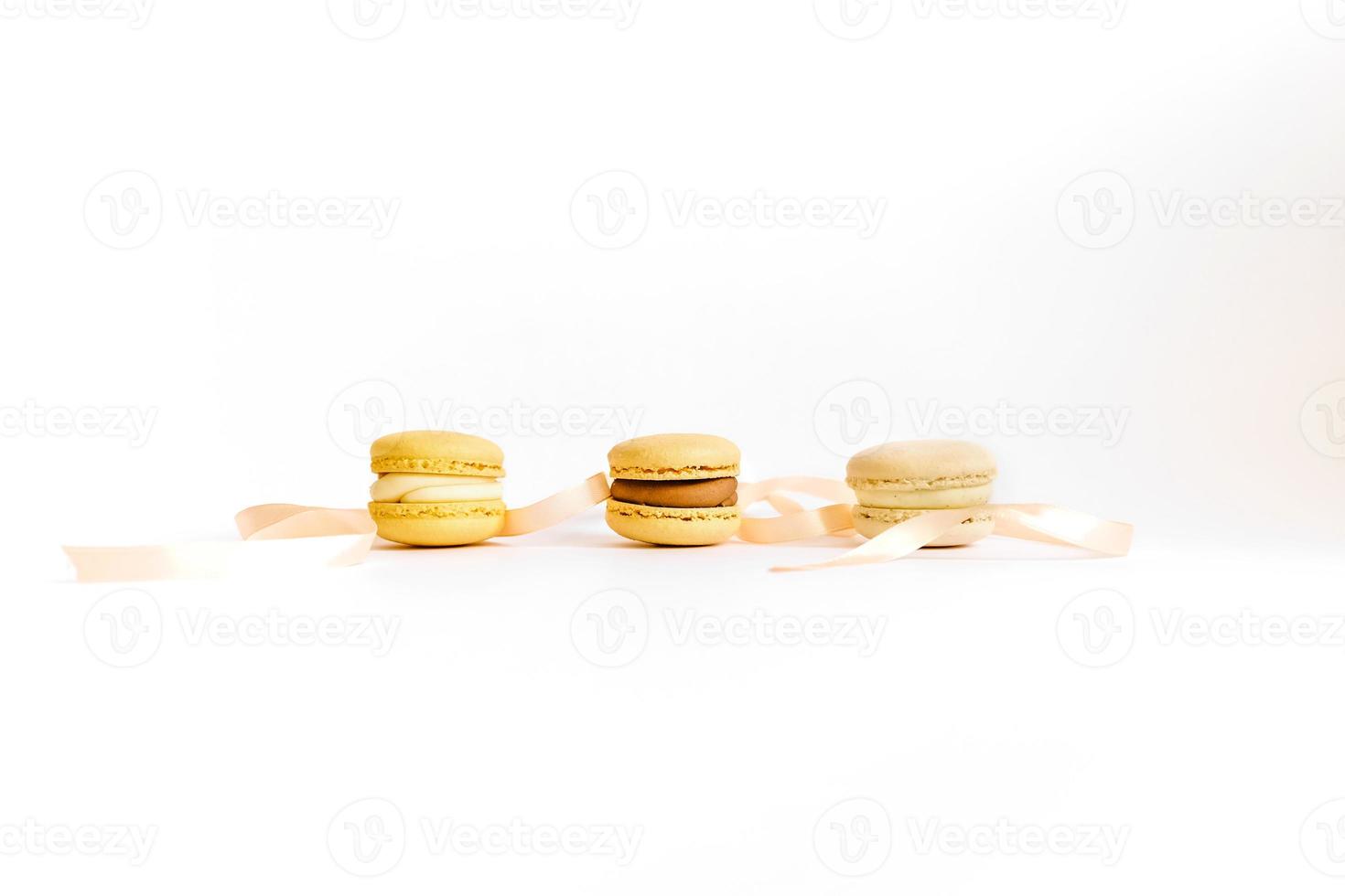 Three macaroons on a white background. photo