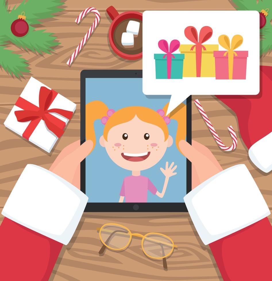 Papá Noel sostiene una tableta y conversa con una niña que habla sobre los regalos que le gustaría recibir en Navidad vector