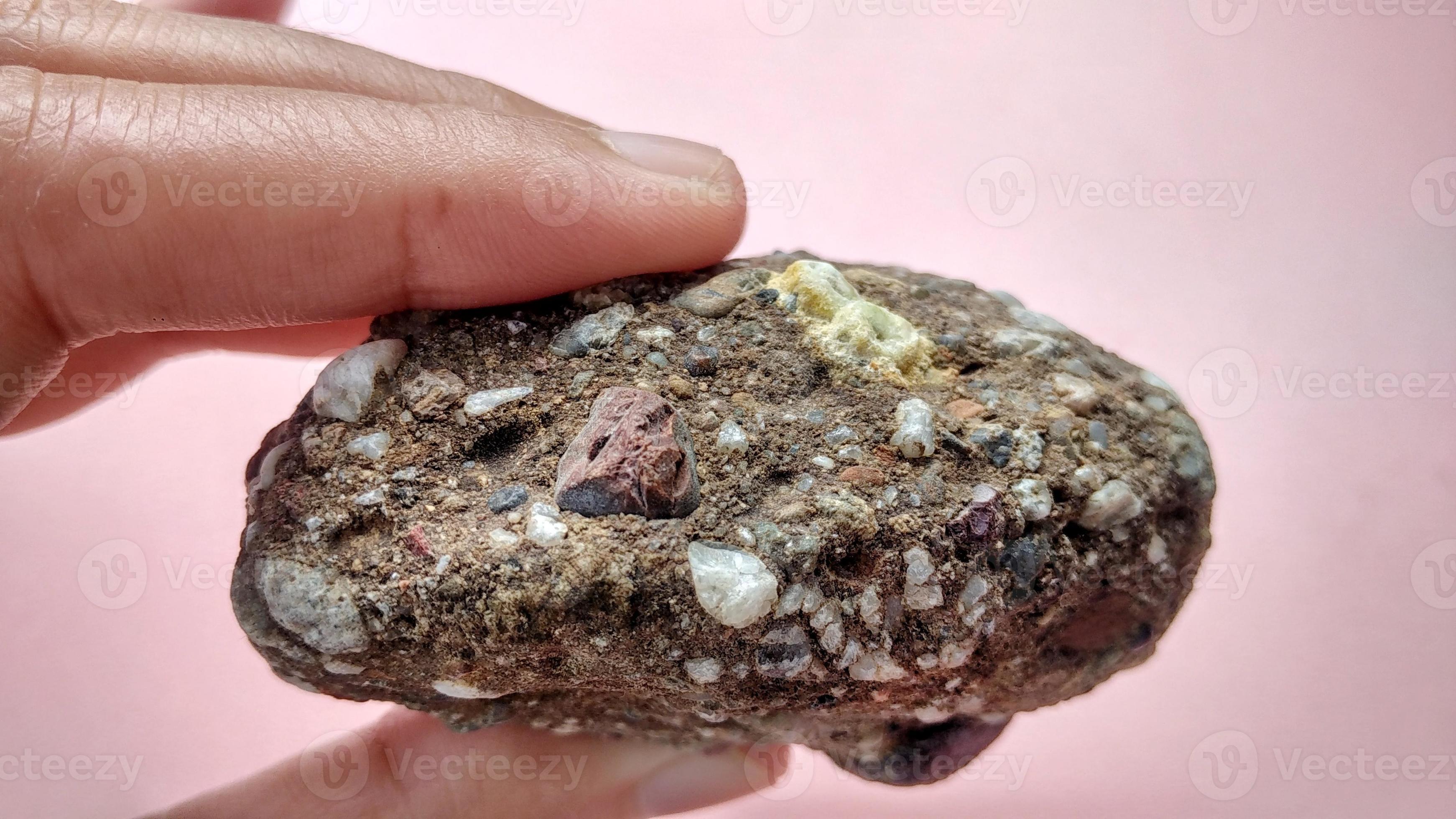 Conglomerate are sedimentary rocks consisting of quartz, red limestone, sand with fragments made