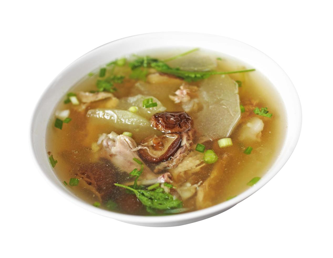 chinese chicken soup in white bowl on white background photo