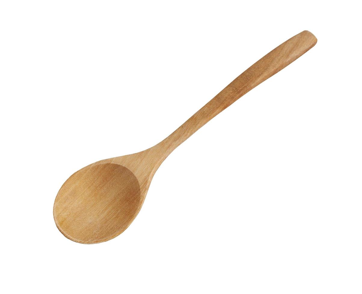 wooden spoon on white background photo