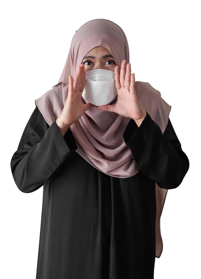 Muslim woman shouting on white background photo