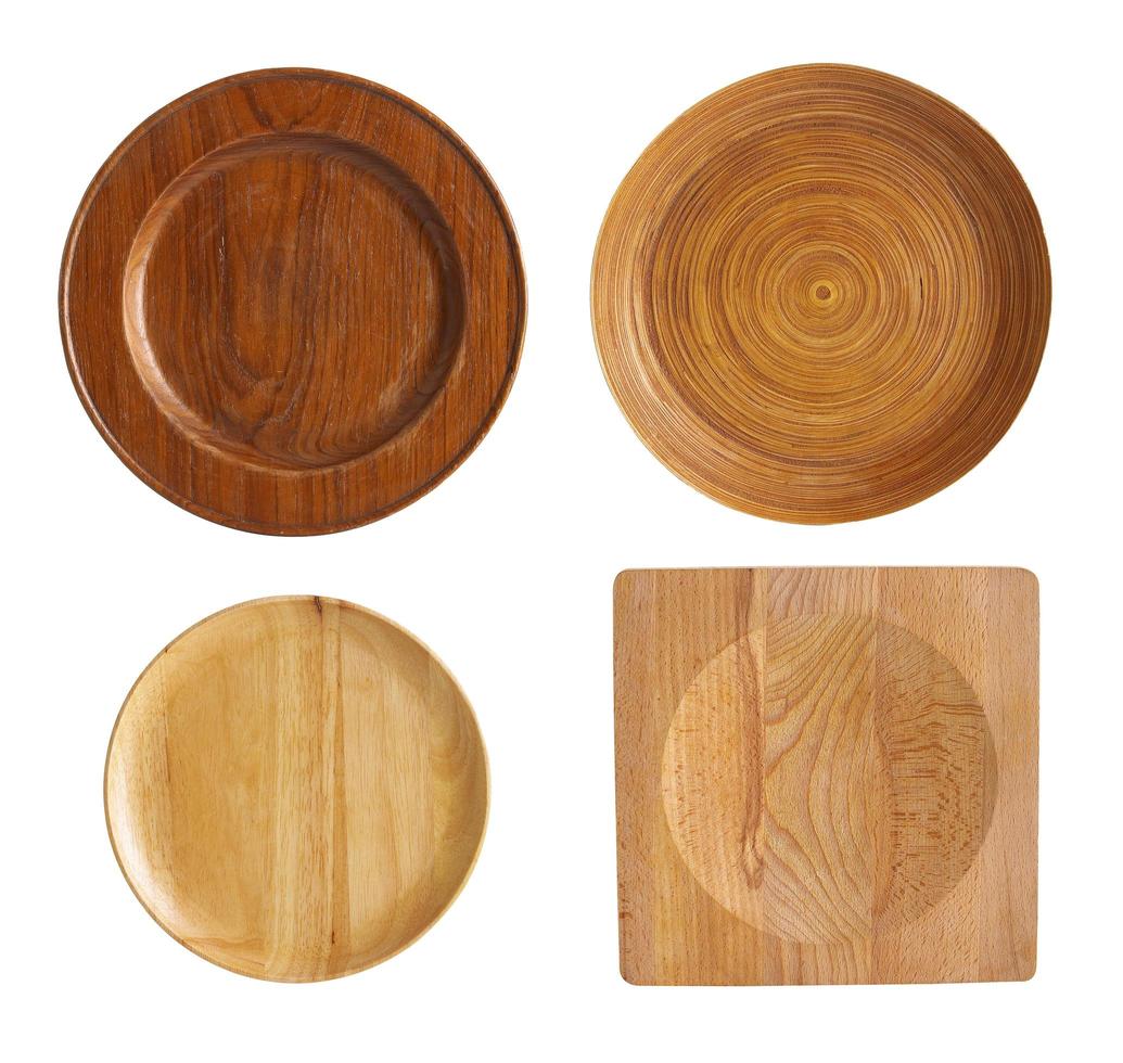 Group of wooden tray on white background photo