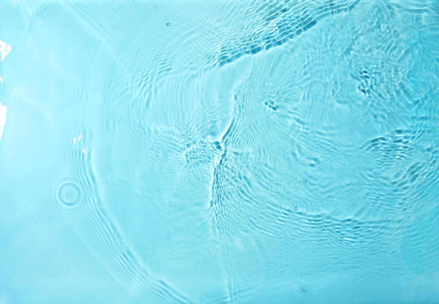 Textura de salpicaduras de agua sobre fondo pastel foto