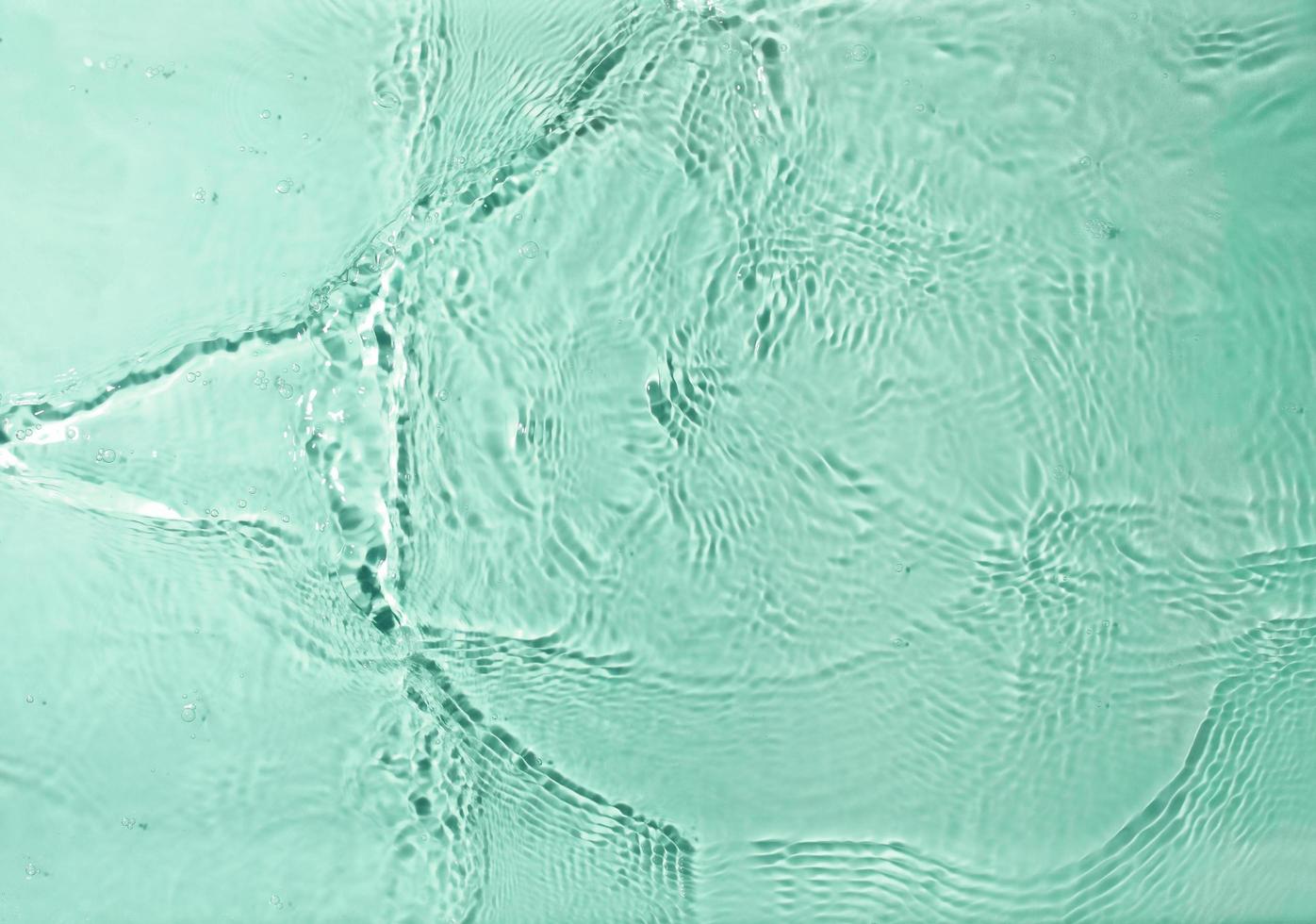 texture of splashing water on pastel background photo