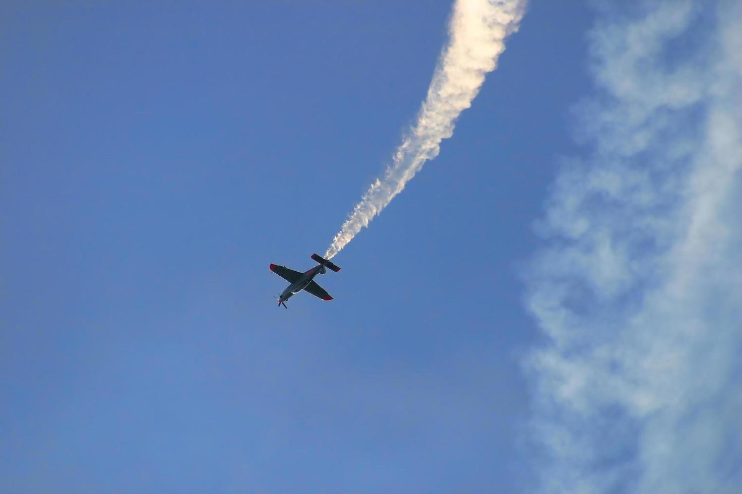 The plane making smoke way, European Aerobatic Championship photo