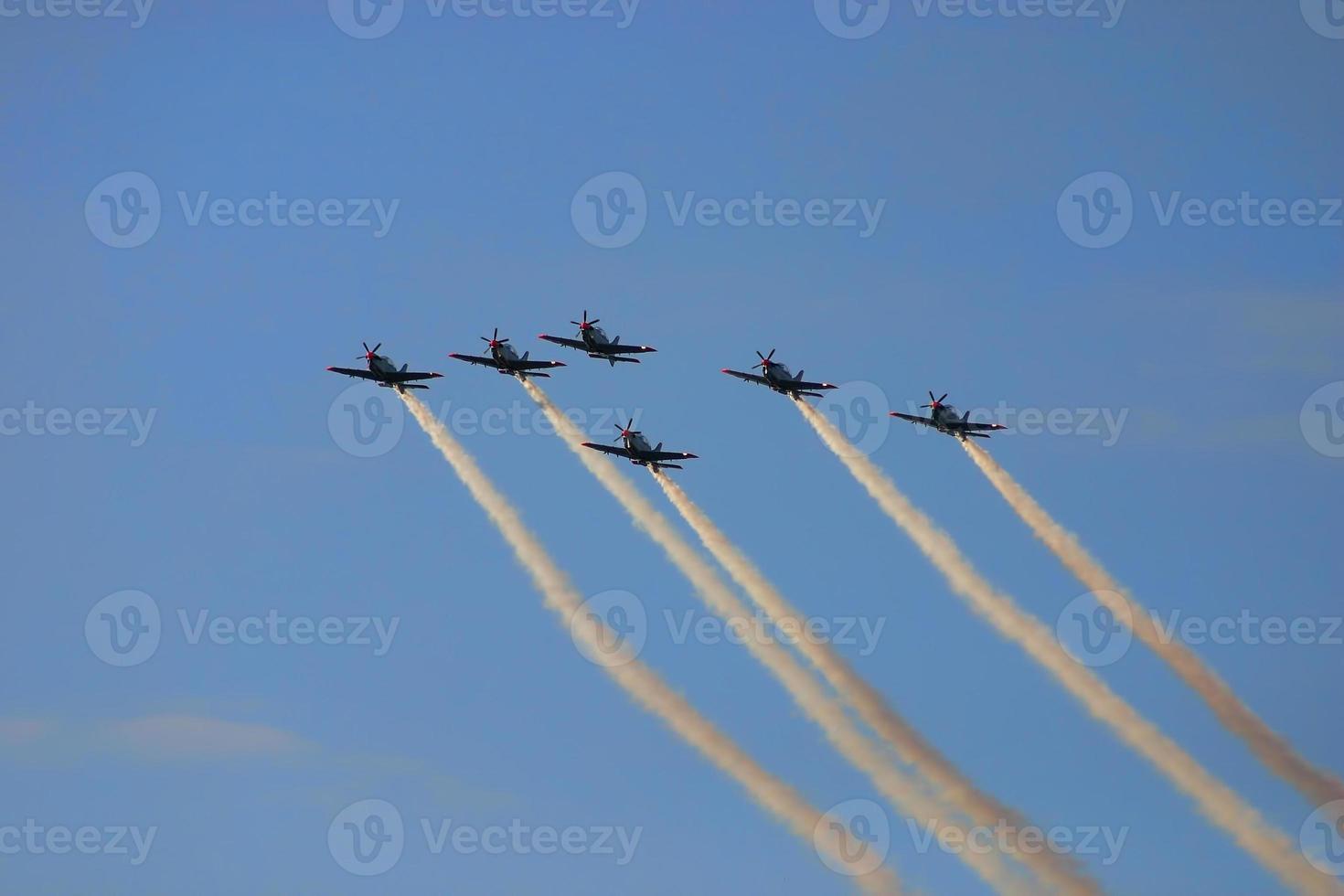 Synchronized team flight- flying in formations photo