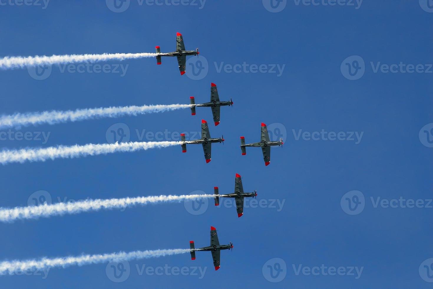 Synchronized team flight- flying in formations photo