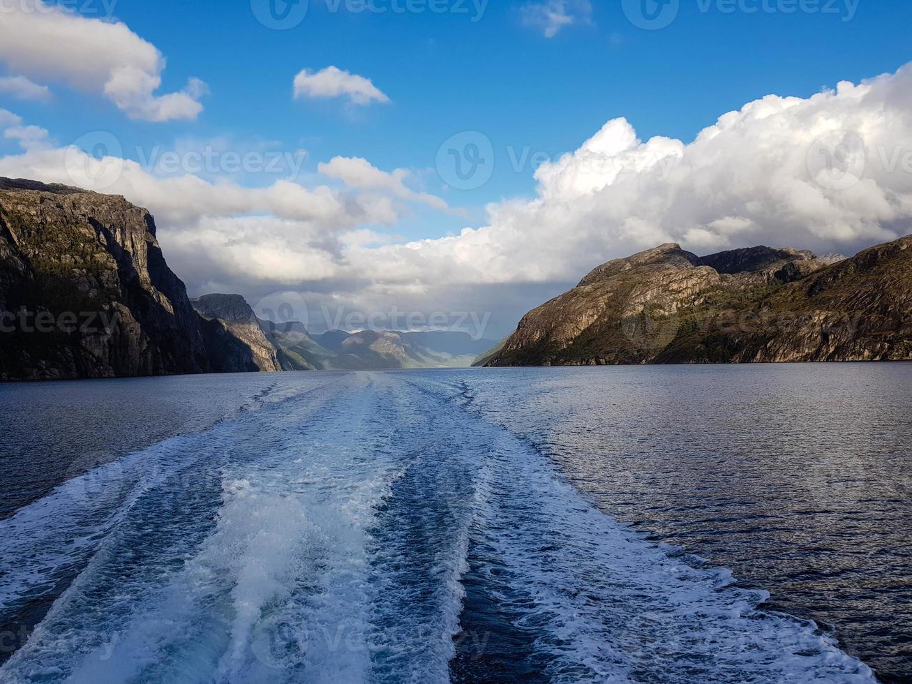 With a cruise ship in the fjords of norway photo