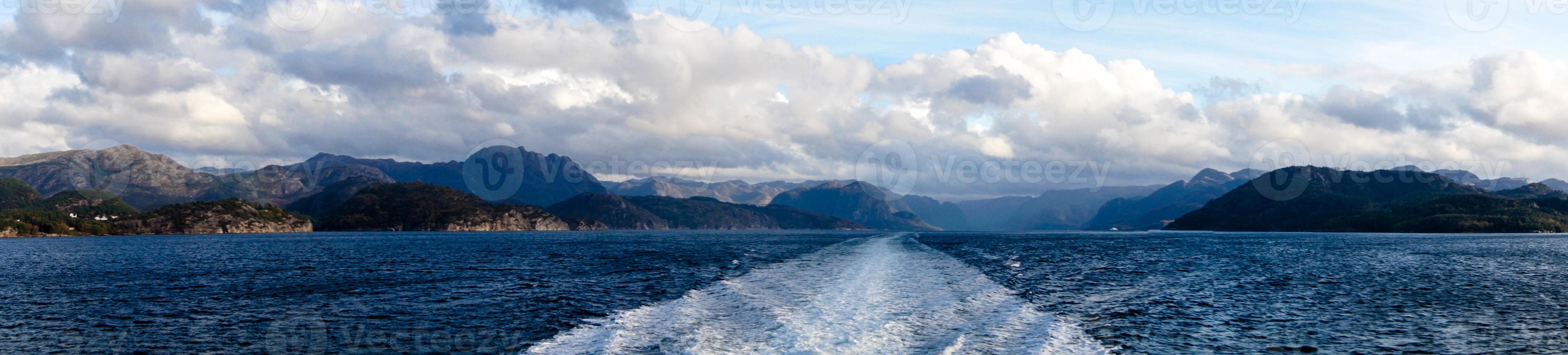 With a cruise ship in the fjords of norway photo