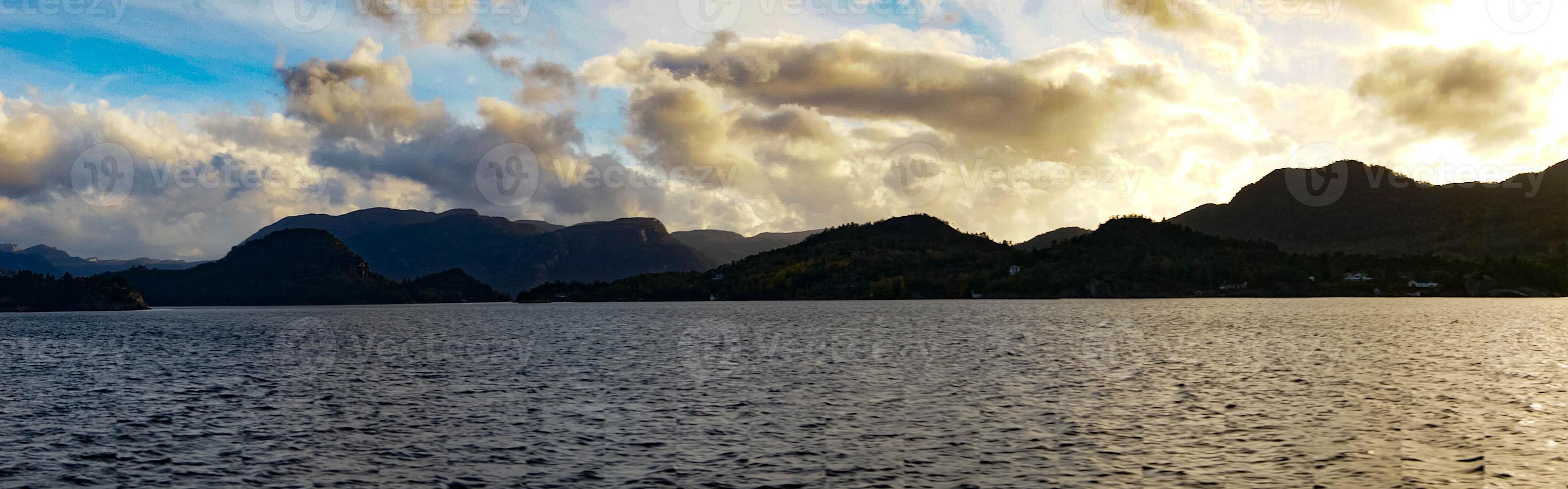 With a cruise ship in the fjords of norway photo