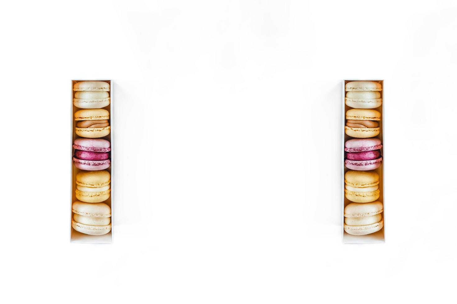 Tasty macaroons on the white isolated background. photo