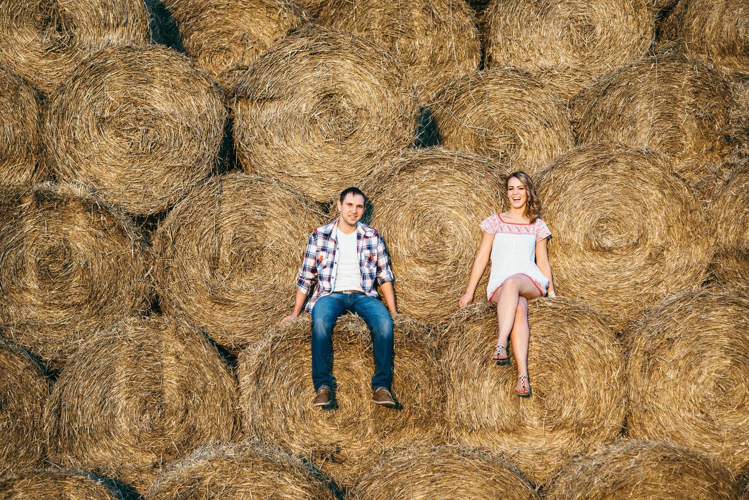 a guy with a girl on a summer walk in the field photo