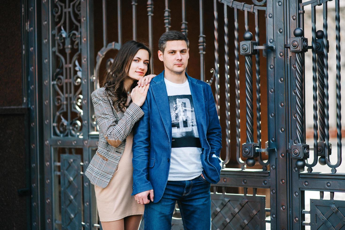 guy and a girl happily walk in the morning on the empty streets photo