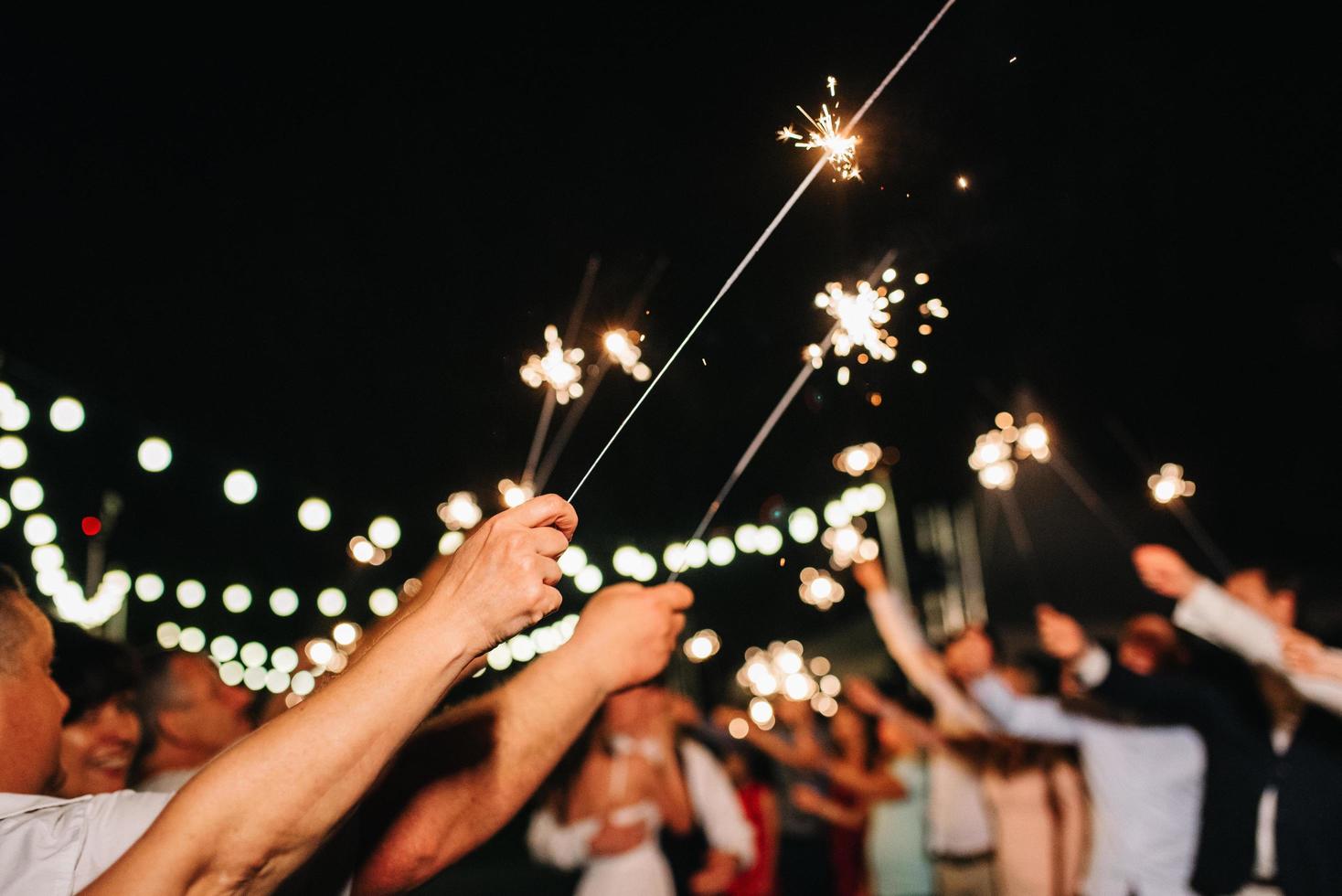 sparklers at the wedding of the newlyweds photo