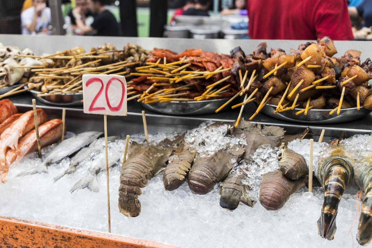 Seafood lobster chicken fish street food with price tag, Malaysia. photo