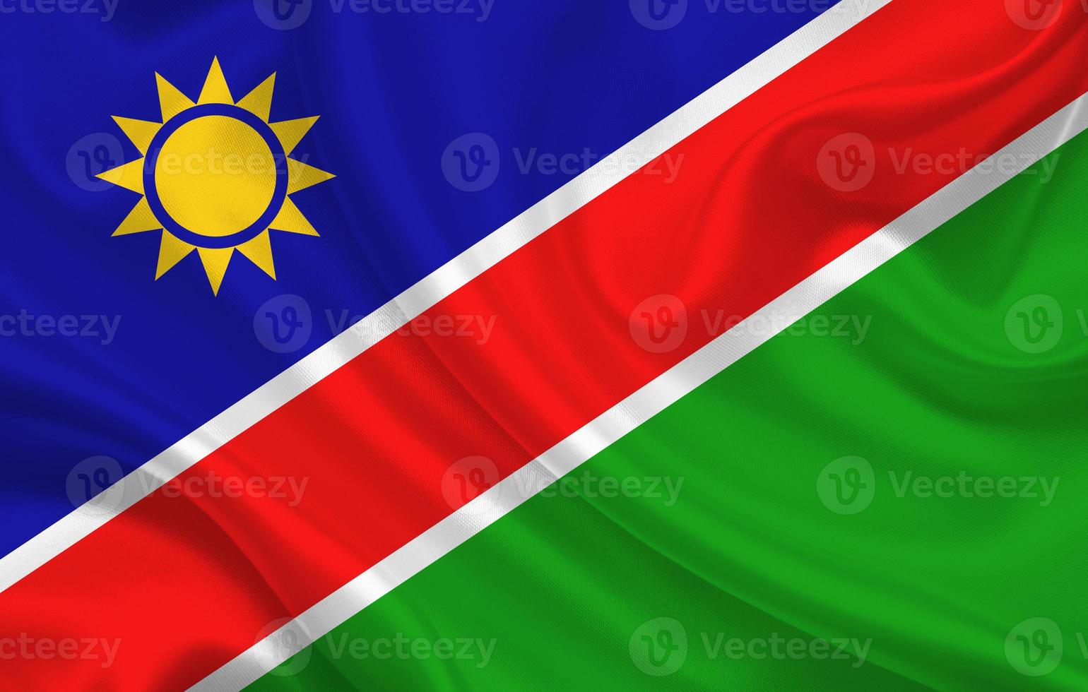 Namibia country flag on wavy silk fabric background panorama photo