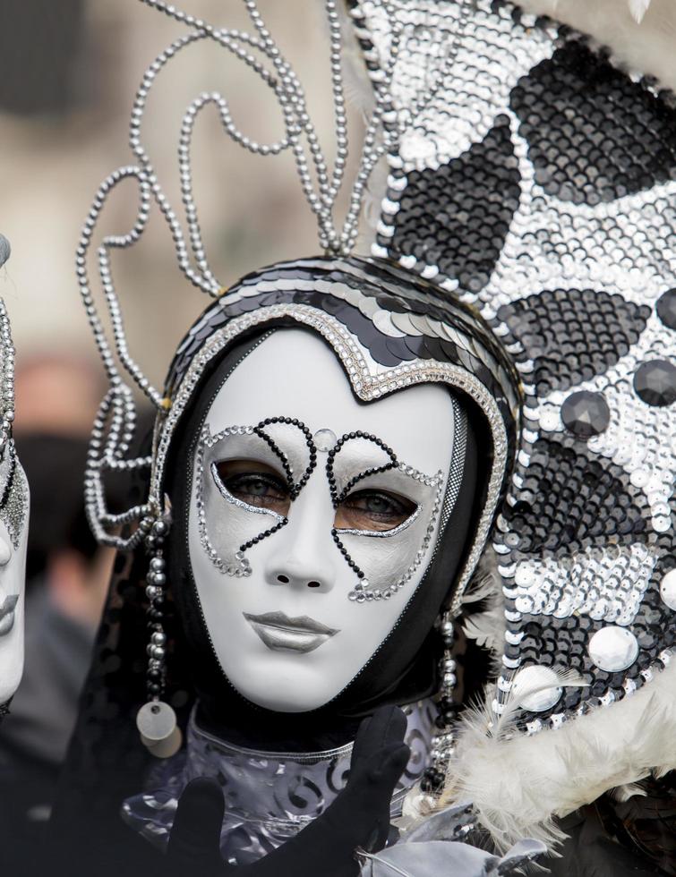 VENICE, ITALY, 2013 - Person in Venetian carnival mask. photo