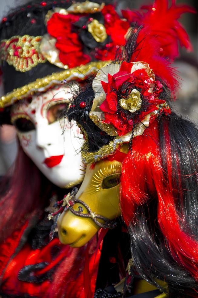 VENICE, ITALY 2013 - Person with Venetian carnival mask photo