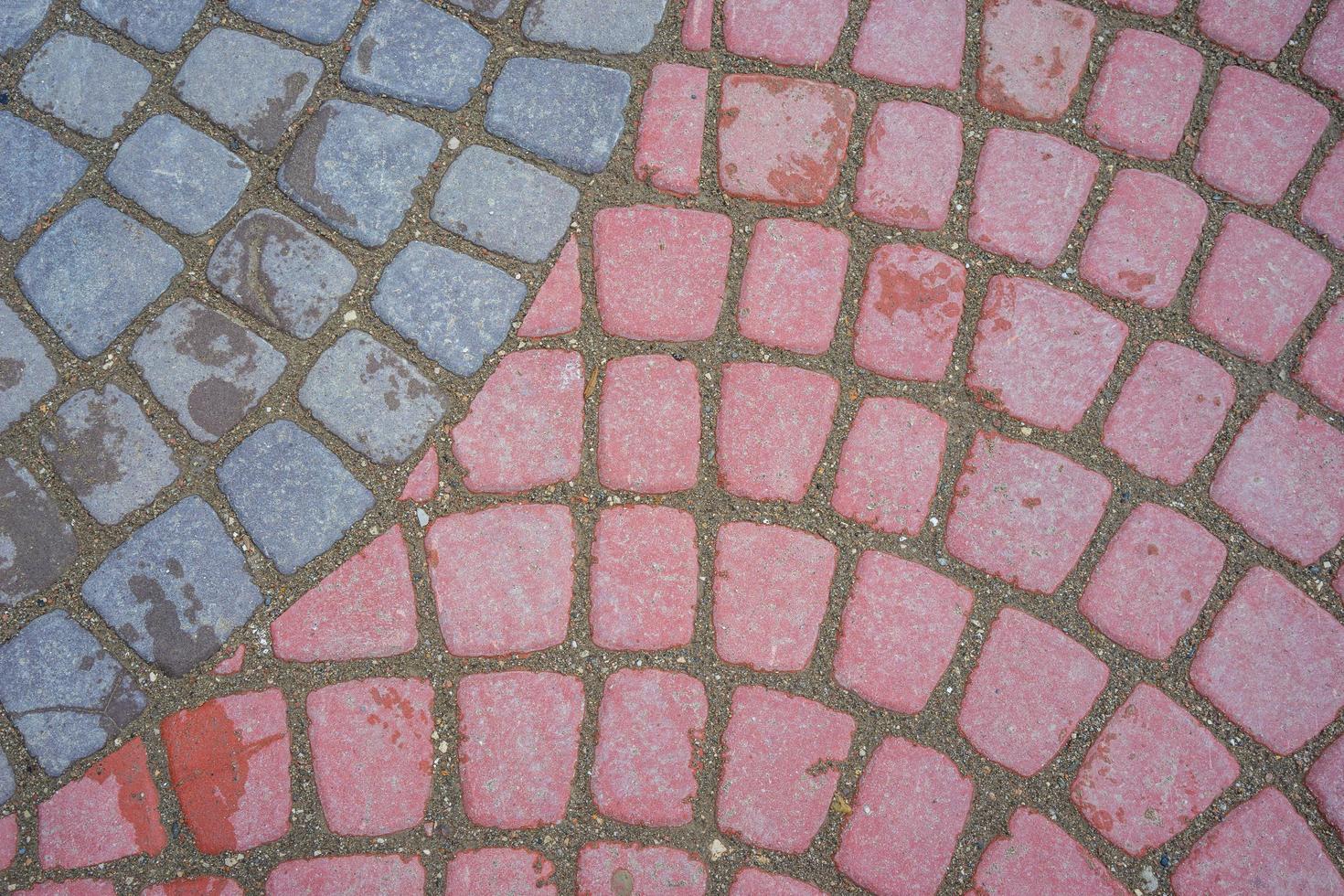 Natural background of multicolored paving stones photo