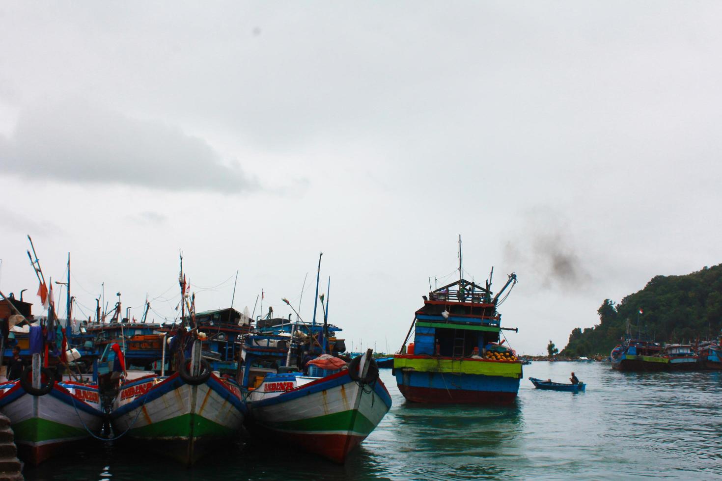 Indonesia 2021. The crowd of the port in the morning. photo