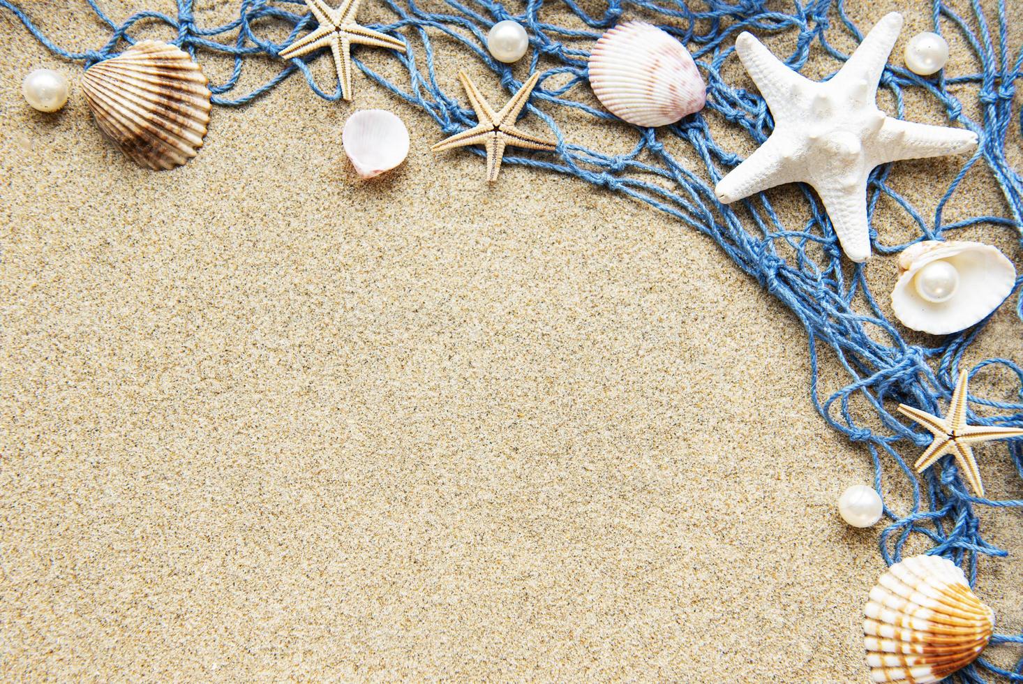 Blue Fishing net on a beach sand, travel concept photo