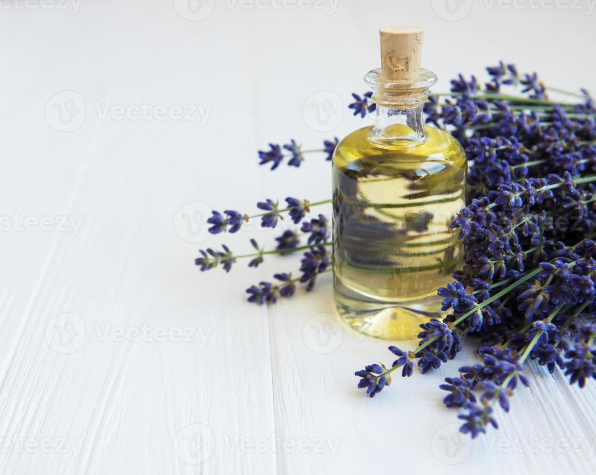 Essential oil with fresh lavender photo