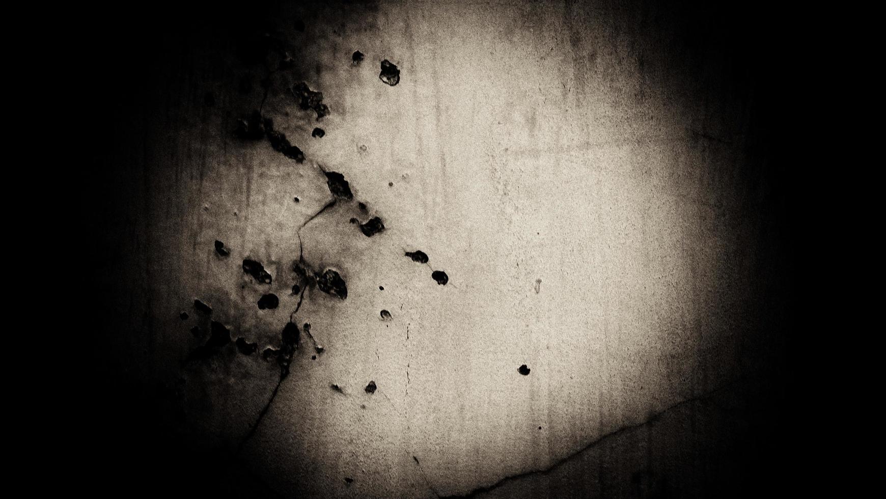 scary dark cement for the background. walls full of stains and scratches photo