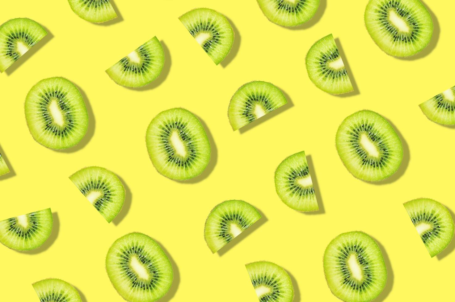 Colorful pattern of kiwi fruits Background photo