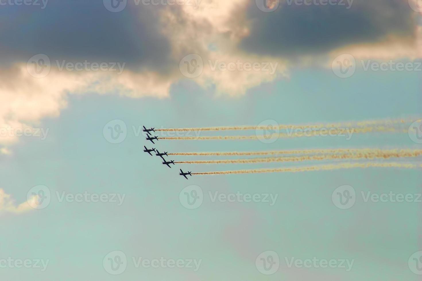 Synchronized team flight- flying in formations photo