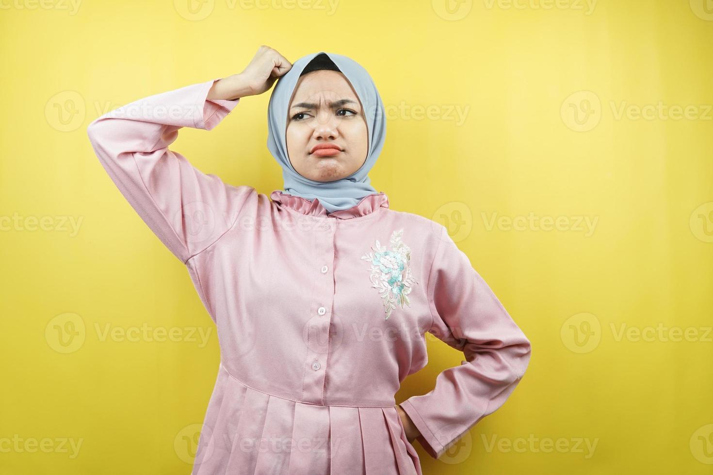 Beautiful young muslim woman sad, confused, thinking, isolated photo