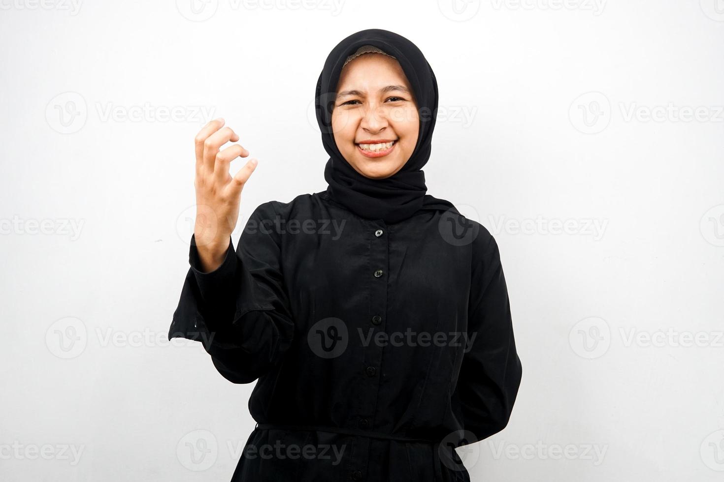 Beautiful young asian muslim woman upset, angry, dissatisfied, displeased, hateful, looking at camera isolated on white background photo