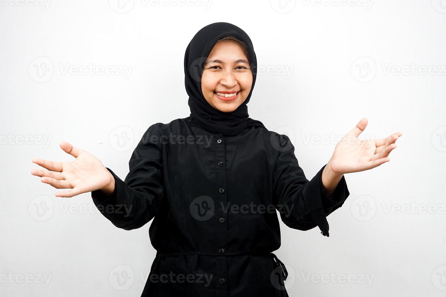Beautiful young asian muslim woman smiling cheerfully, with open arms to camera, welcome sign hand, hand sign wanting to hug, isolated on white background photo