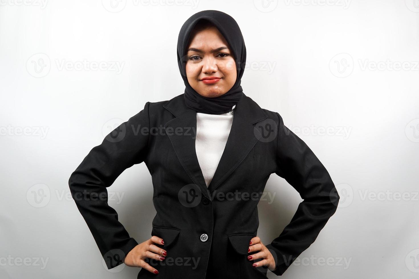 Beautiful young asian muslim business woman pouting, angry, feeling annoyed, dissatisfied, uncomfortable, feeling bullied, lied to, looking at camera isolated on white background photo