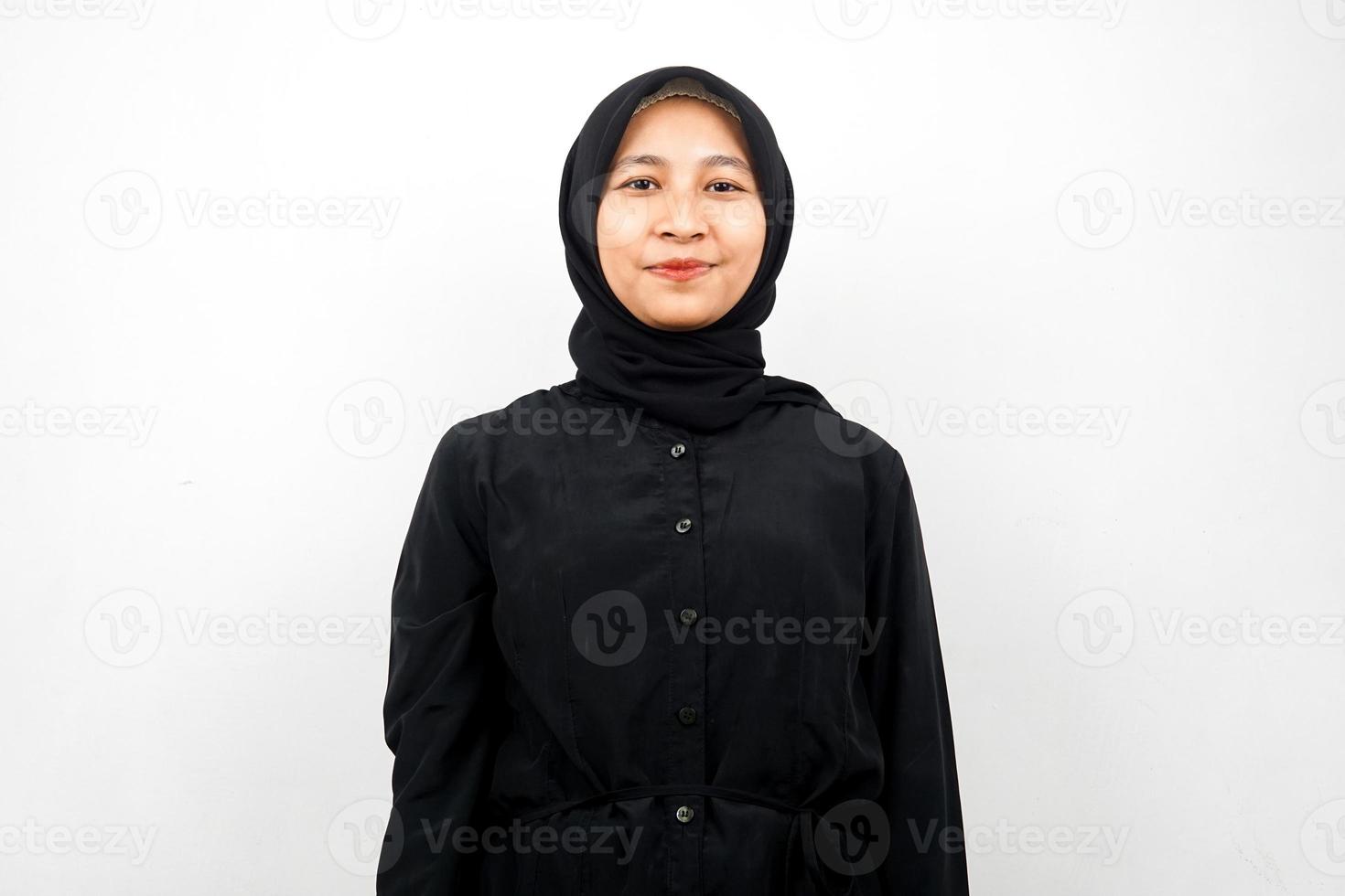 Beautiful young asian muslim woman smiling confidently isolated on white background photo