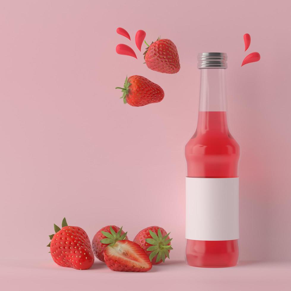 una botella que se usa para contener jugo de fresa con fresas. foto