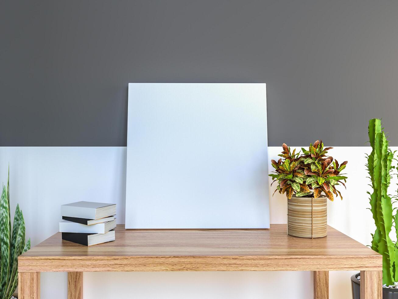 The working room is decorated with a table. Picture Frames and Small Plant Pots photo