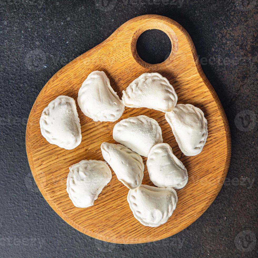 vareniki raw frozen stuffed dumplings semifinished photo