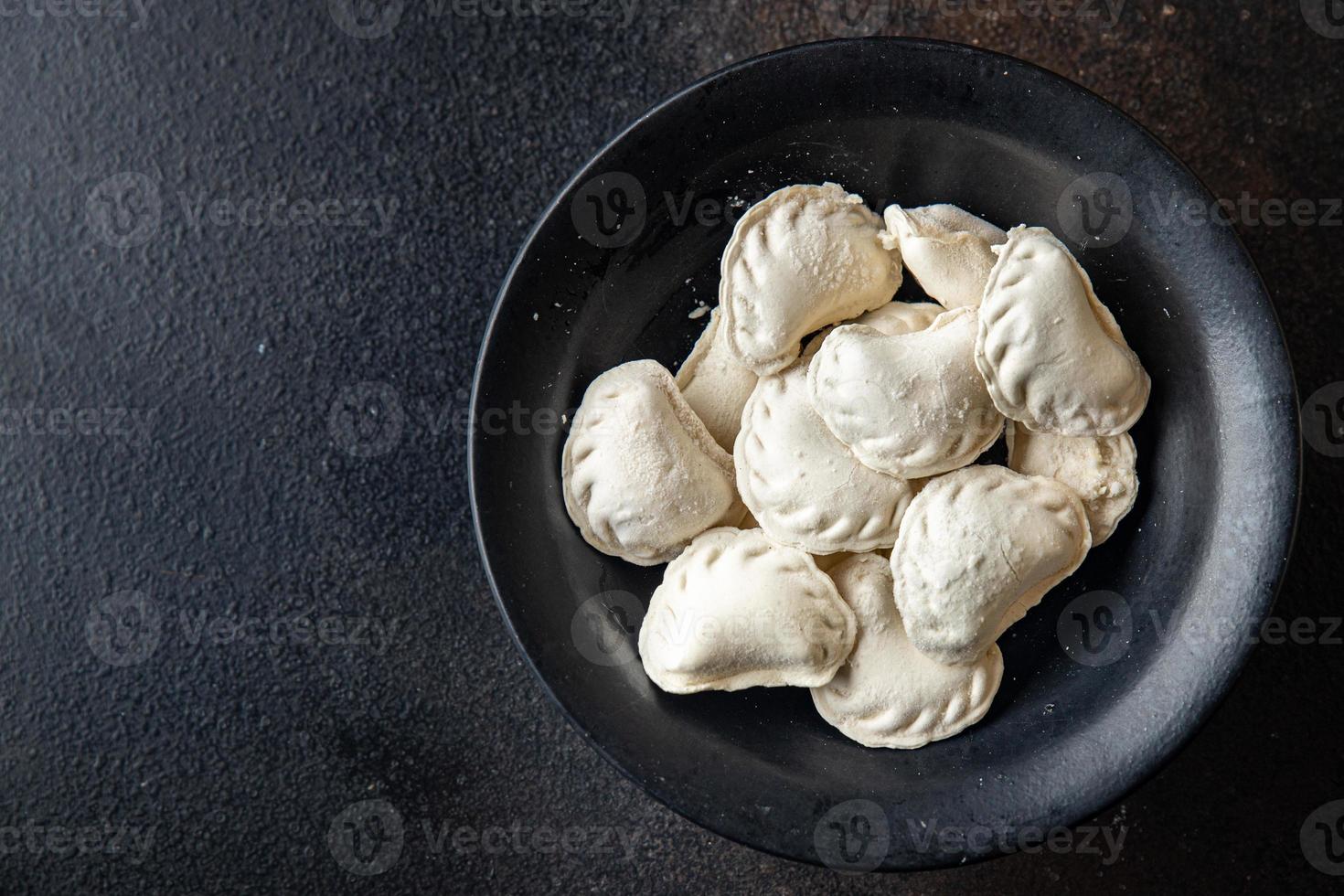 vareniki raw frozen stuffed dumplings semifinished photo